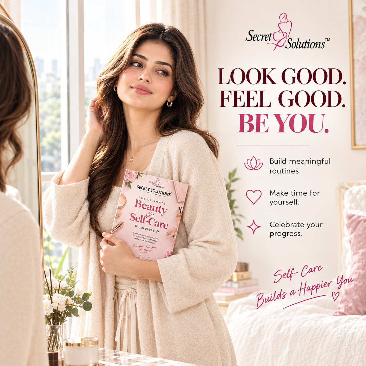 A woman in a cream robe stands in a bright bedroom holding a pink copy of the Secret Solutions Beauty Self-Care Planner. The image includes promotional text on the right side reading 'LOOK GOOD.